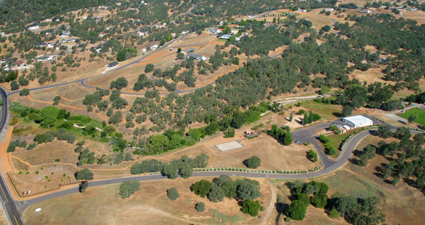 Aerial view of Black Creek Park. The 33+ acre park is available to all Copper Cove property owners and includes: a community center, hiking, biking, and equestrian trails, a riding arena, picnic facilities, and playground equipment.